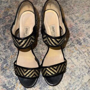 Jimmy Choo Black and Gold Heels with Elegant Design